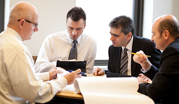 Group of Architects at work in office